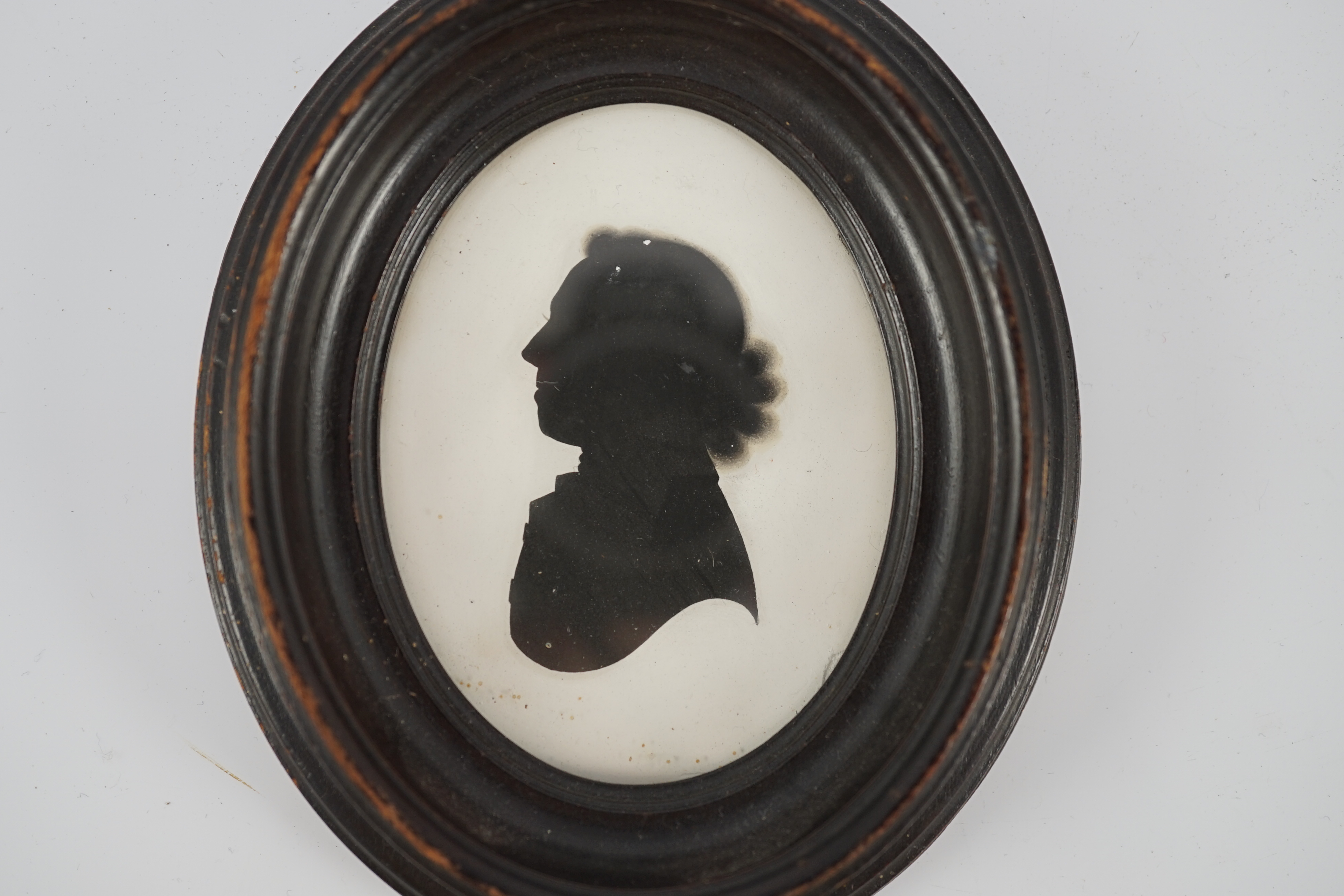 John Miers (1756-1821), Silhouette of 'Lord John Bauff', painted plaster, 8.5 x 6.5cm.